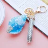 Luxury Diamond Encrusted Pearl Conch Metallic Keychain - Thumbnail Image 5